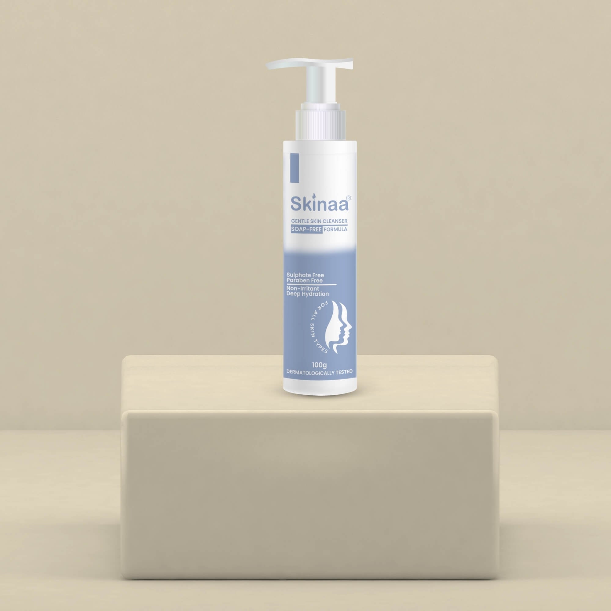 Skinaa Gentle Skin Cleanser pump bottle displayed on a beige pedestal with minimal background, dermatologically tested mild face cleanser for sensitive and hydrated skin